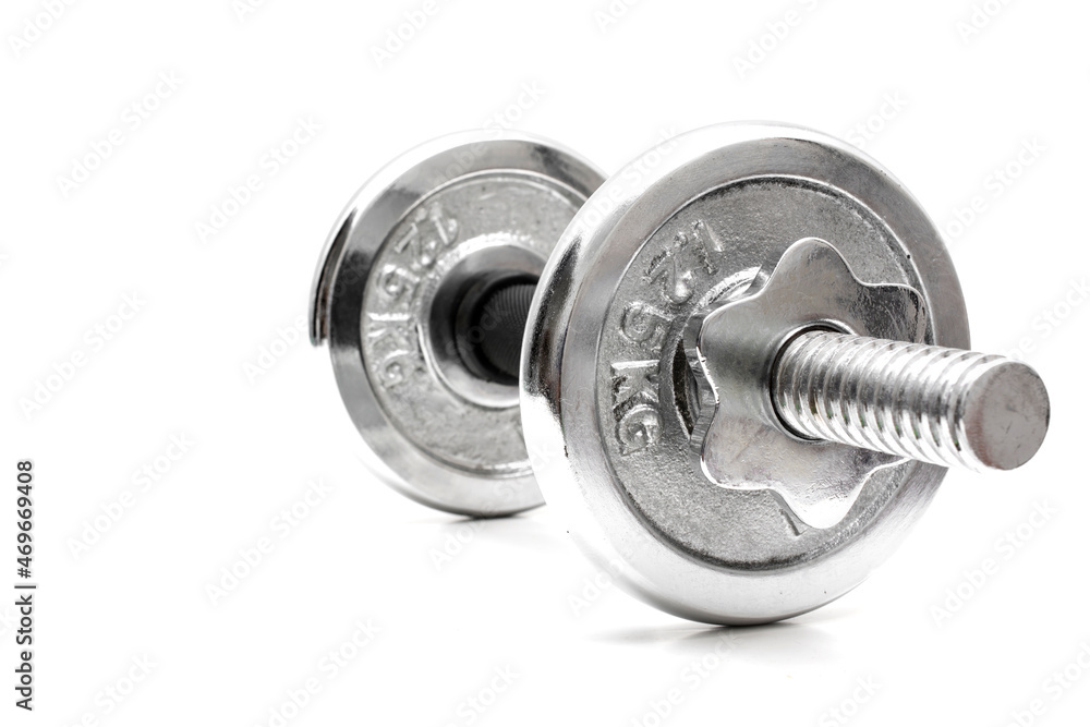 Dumbbell on white background with copy space. Dumbbell on white background with copy space.