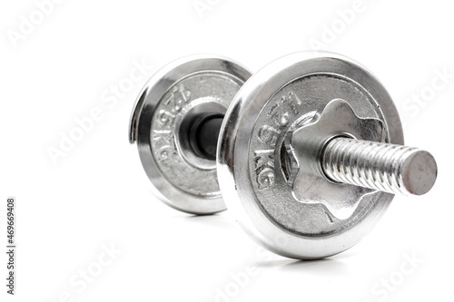 Dumbbell on white background with copy space. 
