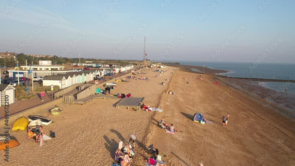 people relaxing at coast, spending time on sandy beach. Aerial view of sea coast. Southend-on-Sea, UK people relaxing at coast, spending time on sandy beach. Aerial view of sea coast. Southend-on-Sea, UK