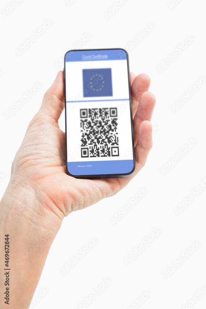 Man holding smartphone with covid 19 vaccine passport Man holding smartphone with covid 19 vaccine passport