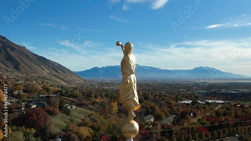 Angel Moroni Gold Statue with Trumpet on Provo LDS Mormon Temple, Extremely Detailed Aerial Closeup photo