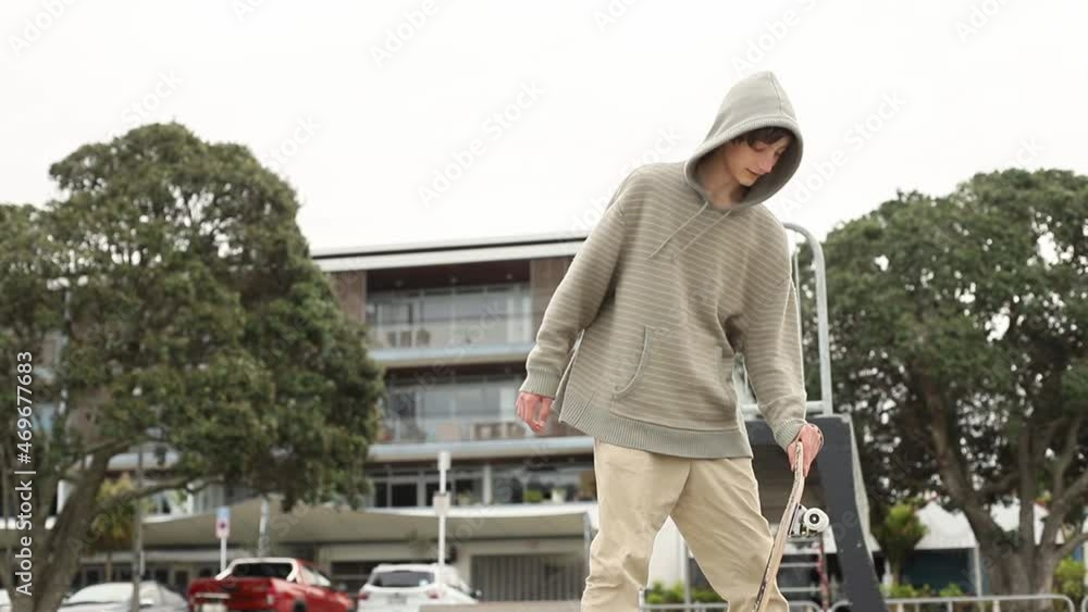Teenager boy in a skate park, outdoor portrait. adolesence concept, teen culture. Teenager boy in a skate park, outdoor portrait. adolesence concept, teen culture.