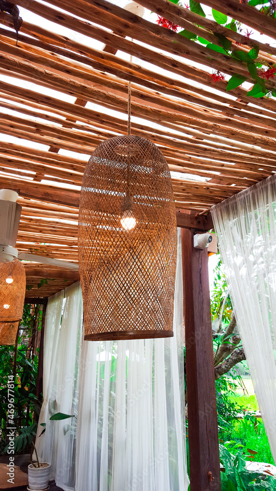 Brown dried weaved bamboo lamps hanging from the cailing