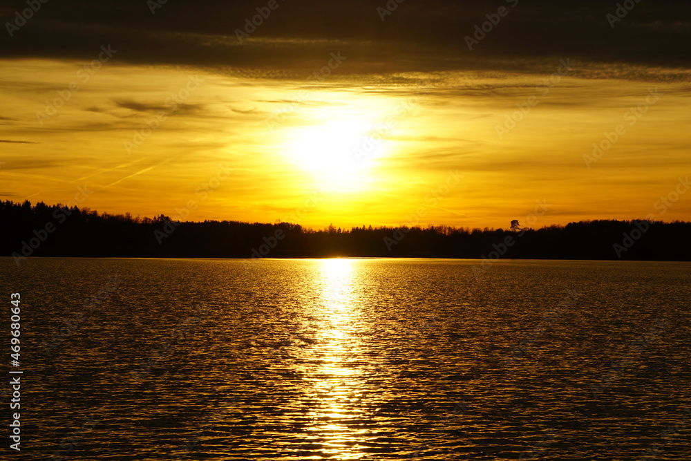 sunset over the lake sunset over the lake