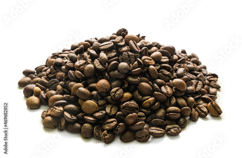 Canvas Print Handful of roasted coffee beans on white background