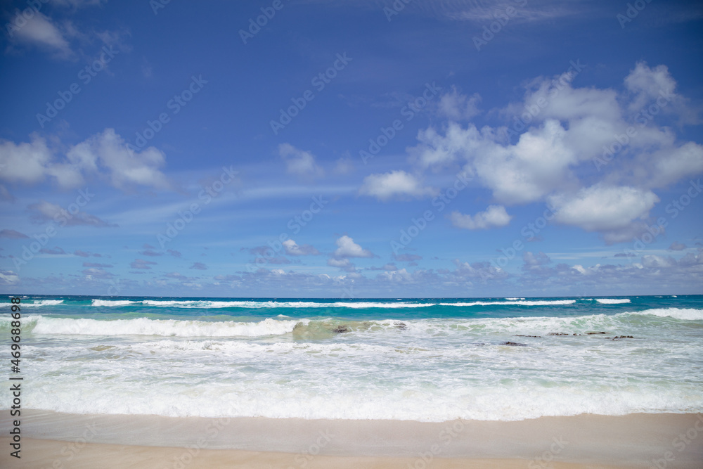 Tranquil beach scene with rolling waves at Murrel's Beach, Portland Victoria Australia