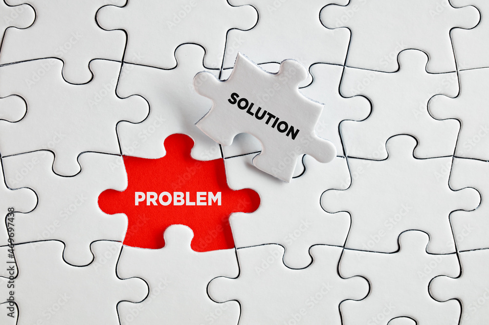 Problem and solution words on the missing puzzle pieces. To find a solution  for a problem Photos | Adobe Stock