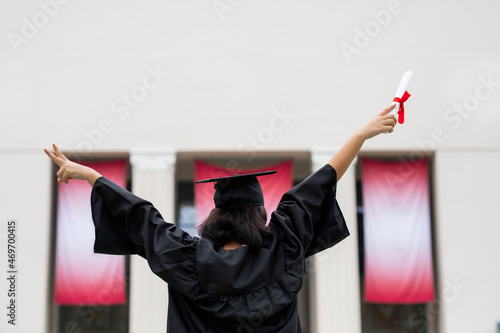 Graduating student celebrating academic achievement