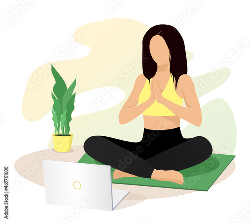 Woman watching online classes on laptop, practicing yoga, meditation and doing exercise. Live stream, internet education