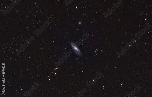 M106, Messier 106 (NGC 4258) is an intermediate spiral galaxy in the constellation Canes Venatici. photo