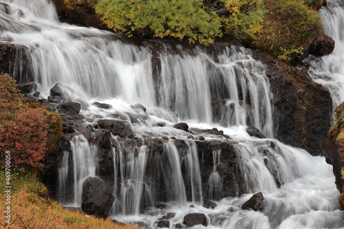 Hraunfossar  a cascade of small waterfalls flowing into the Hvita river  Vesturland  Iceland.