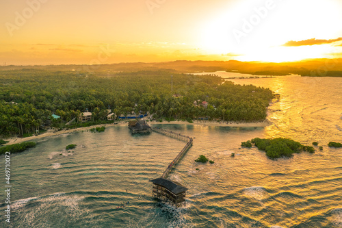 Sunset at Cloud Nine Surfing Area, Siargao Island, Philippines. Aerial Drone shot. photo