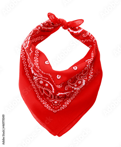 Photo Tied red bandana with paisley pattern isolated on white, top view