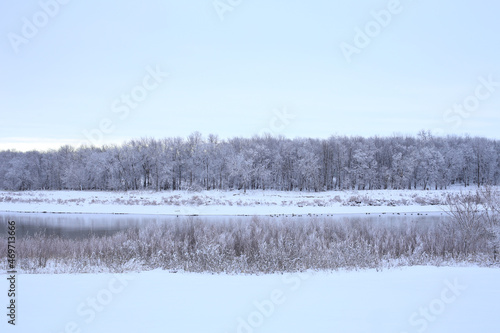 Beautiful Red River View. Frost Snow Day. Peaceful Concept. © Thamyris