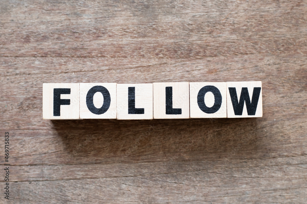 Fototapeta premium Alphabet letter block in word follow on wood background