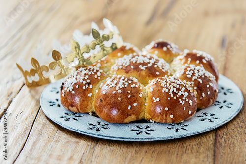 King Bread, called in German language Dreikönigskuchen, baked in Switzerland on January 6th. Small plastic miniature of the king is hidden inside of the bread.