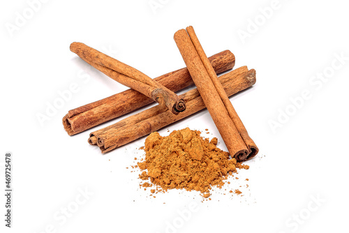 Wallpaper Mural Herb, heap of dried cinnamon bark and powdered cinnamon, isolated on a white background. Torontodigital.ca