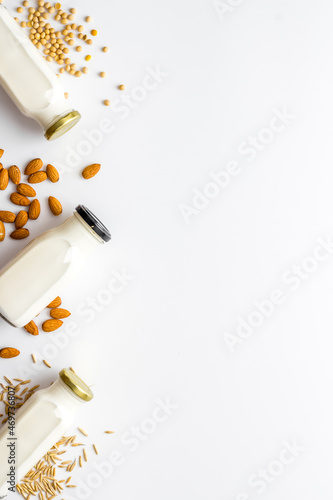 Non dairy vegan milk with nuts and cereals. Diet nutrition concept