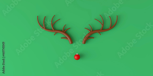 Abstract minimal Christmas reindeer face made with antlers and a bauble decoration nose. 3D Rendering photo