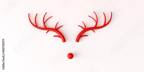 Abstract minimal Christmas reindeer face made with antlers and a bauble decoration nose. 3D Rendering