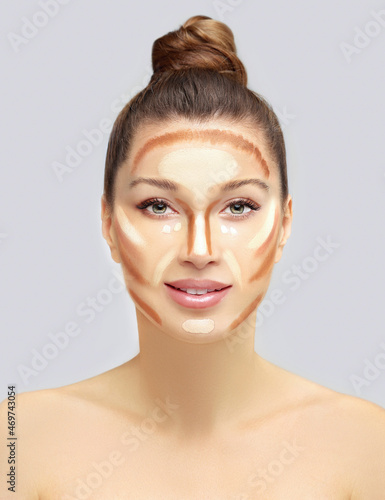 Contouring.Make up woman face. Contour and highlight makeup.