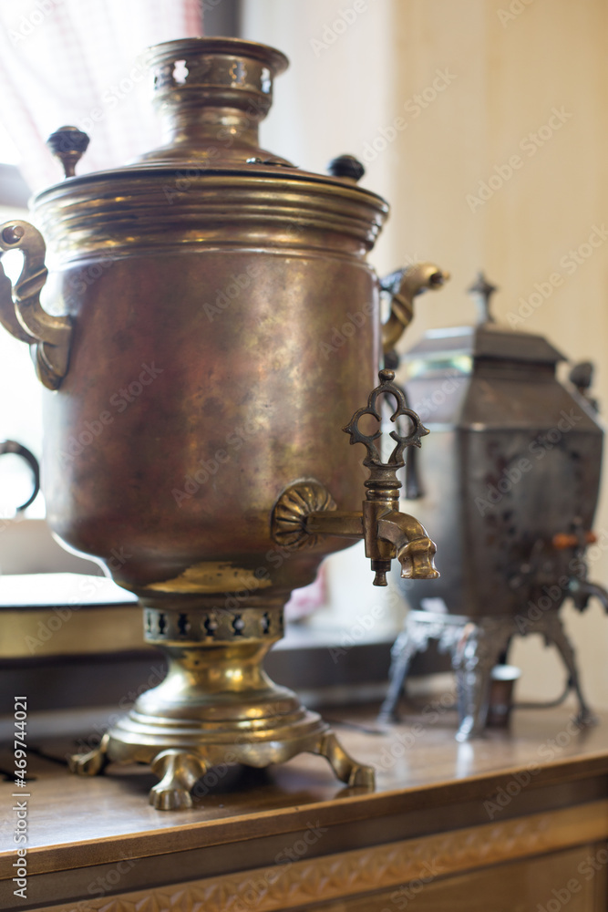 Antique samovar made of copper and bronze Antique samovar made of copper and bronze