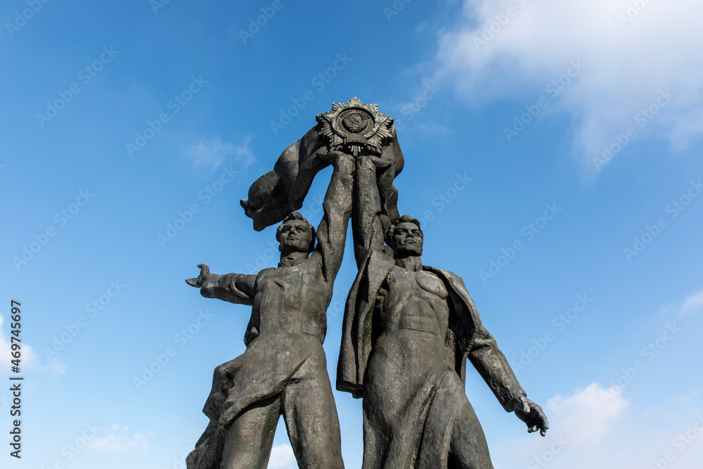Soviet Monument dedicated to Russian-Ukrainian friendship under the People's Friendship Arc in Kyiv, Ukraine, Europe