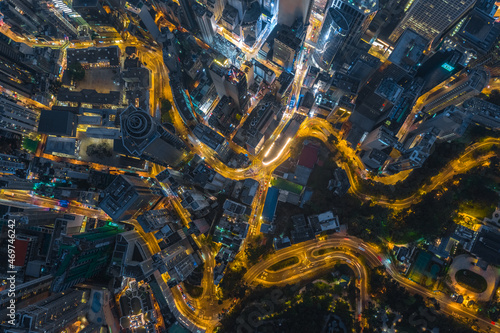 Aerial top view a Hong Kong Corporate Buildings streets at night time.