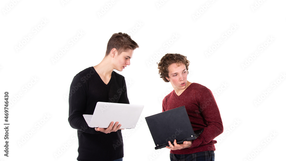 Two handsome guys work and study online.