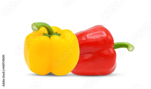 Whole red yellow bell pepper isolated on white background.