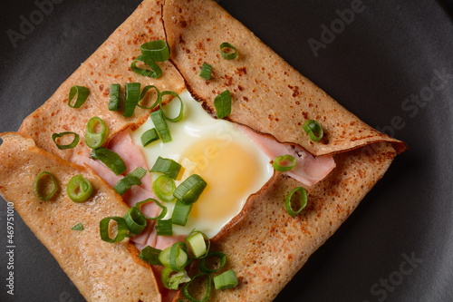 Quadro su tela Breton galette, galette sarrasin, buckwheat crepe, with fried egg, cheese, ham