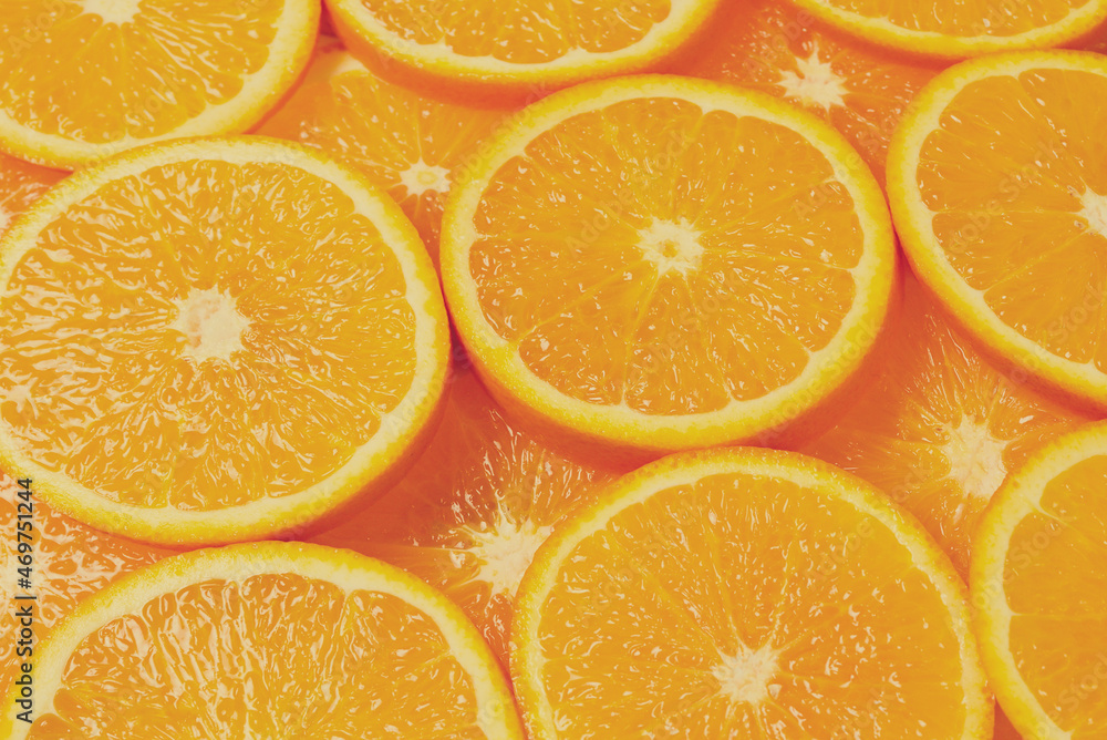 Slices of oranges as a background, top view. Slices of oranges as a background, top view.