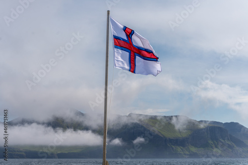 The Faroe Islands Flag, with its White and cross Red a blue stripes 