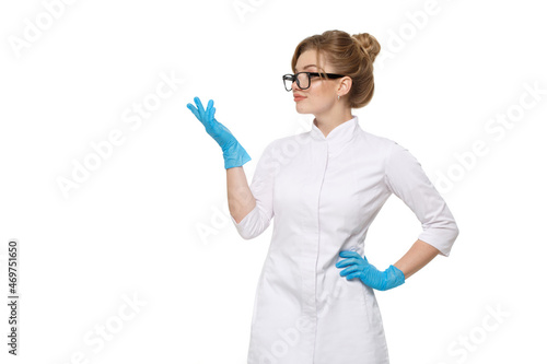 Cute girl doctor in uniform and blue medical gloves isolated on a white background.