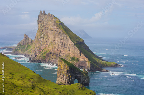 The famous Drangarnir Arch and the beautiful island Tindholmur on the Faroe Islands