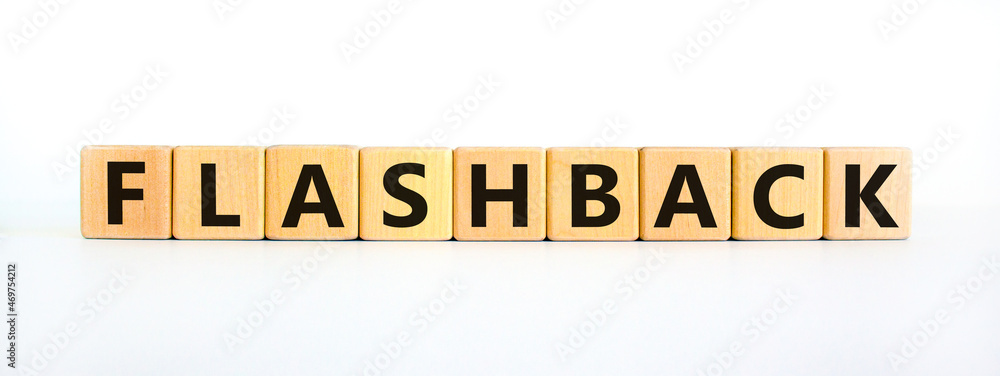 Flashback symbol. The concept word Flashback on wooden cubes. Beautiful white table, white background. Business and flashback concept. Copy space. Flashback symbol. The concept word Flashback on wooden cubes. Beautiful white table, white background. Business and flashback concept. Copy space.