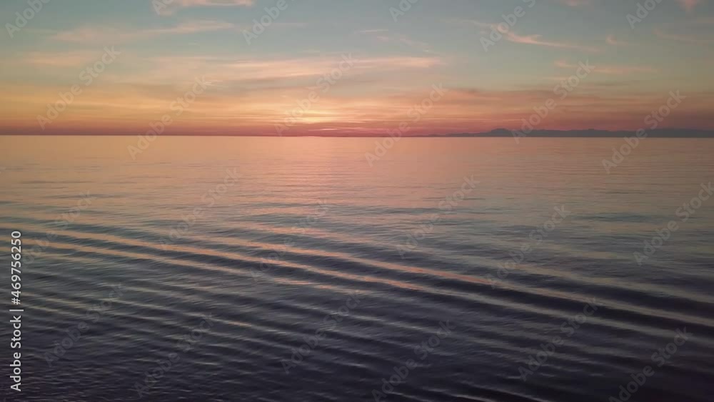 shooting in flight sunset on the sea. evening sky over the water. shooting in flight sunset on the sea. evening sky over the water.
