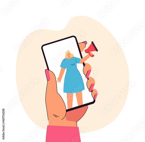 Hand holding phone with woman speaking into megaphone on screen. Girl advertising, announcing news or sales flat vector illustration. Announcement, marketing, communication concept for banner