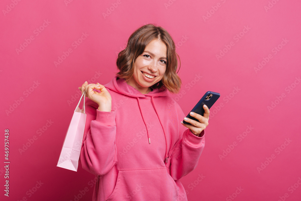 Photo of beautiful young woman buying something online with smartphone, online shopping. Photo of beautiful young woman buying something online with smartphone, online shopping.