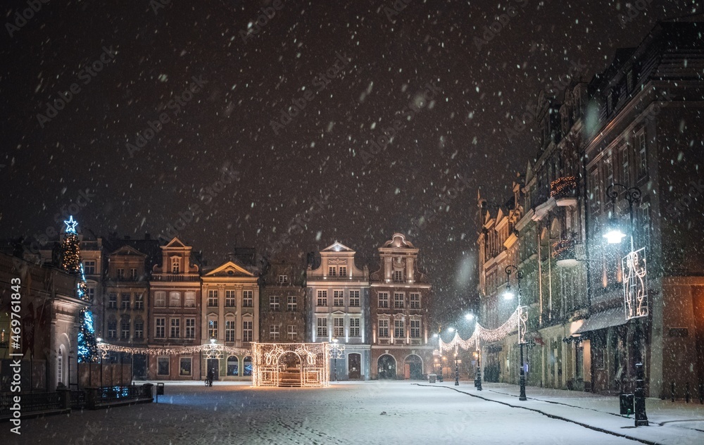 Late-night snowing at the Old Town square in Poznan, Poland