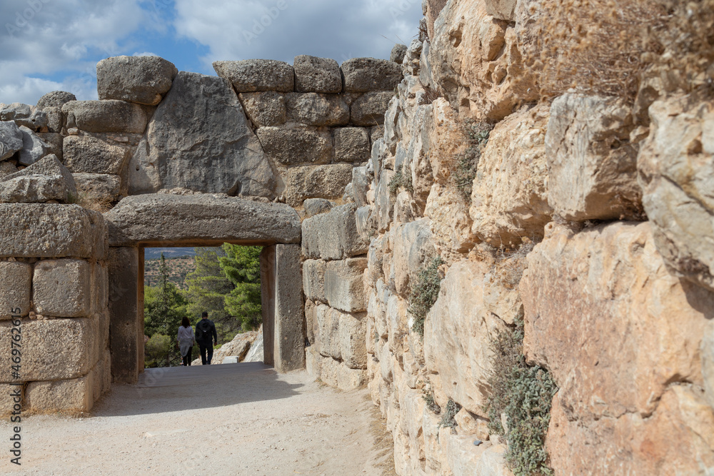 Ancient Greek city Mykines with walls made of giant stones and a bas relief with standing lions