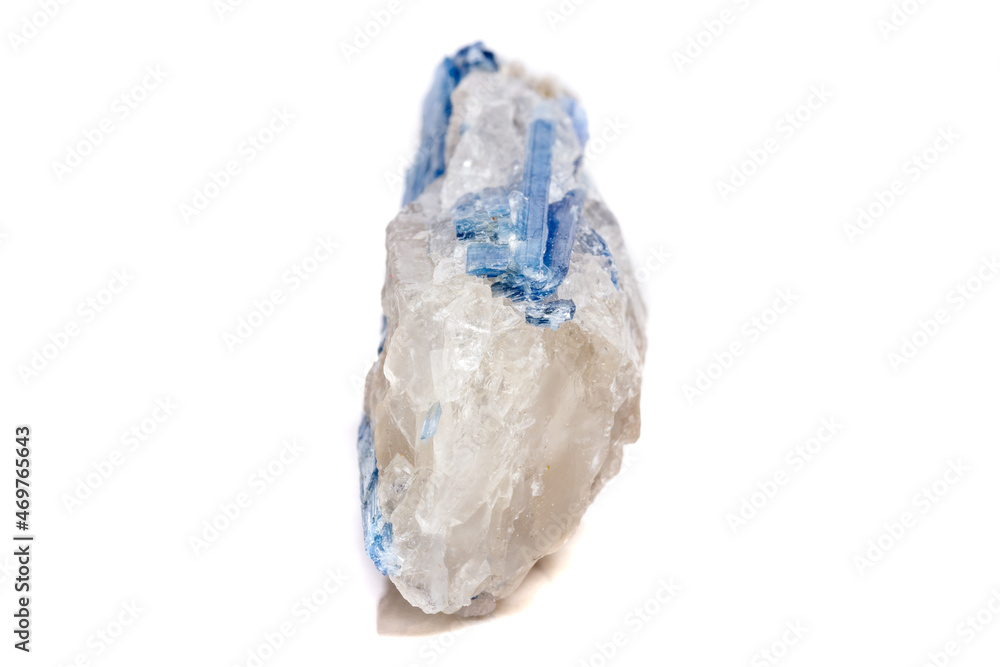 Macro mineral stone Kyanite a white background