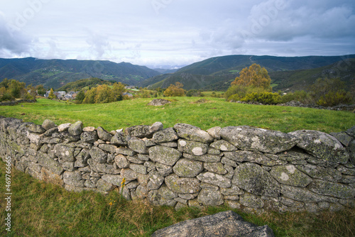 Ancient dry stone walls delimit the pastures in Ancares