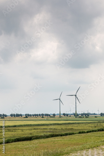 Wind wheels for renewble energy on the flat marshland of North Germany