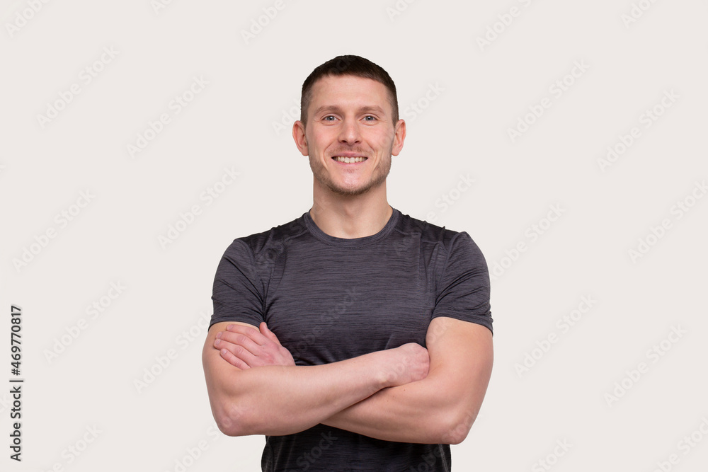 Fototapeta premium Sportsman Hands Crossed Smiling. Healthy Life, Medical protection, Sports Concept