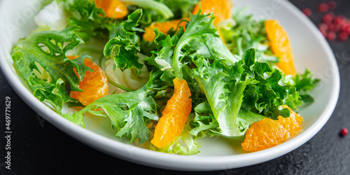 tangerine salad leaves green mix fresh citrus meal snack on the table copy space food background rustic. top view keto or paleo diet veggie vegan or vegetarian food no meat