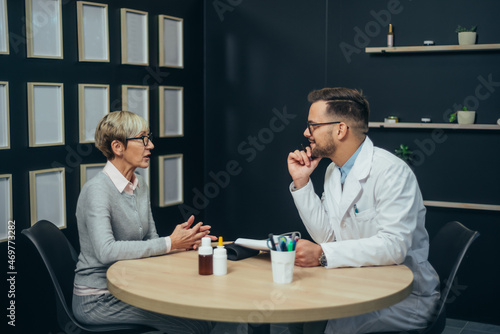 Doctor in consultation with a senior patient