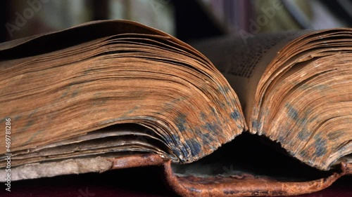 Old book on a wooden table
