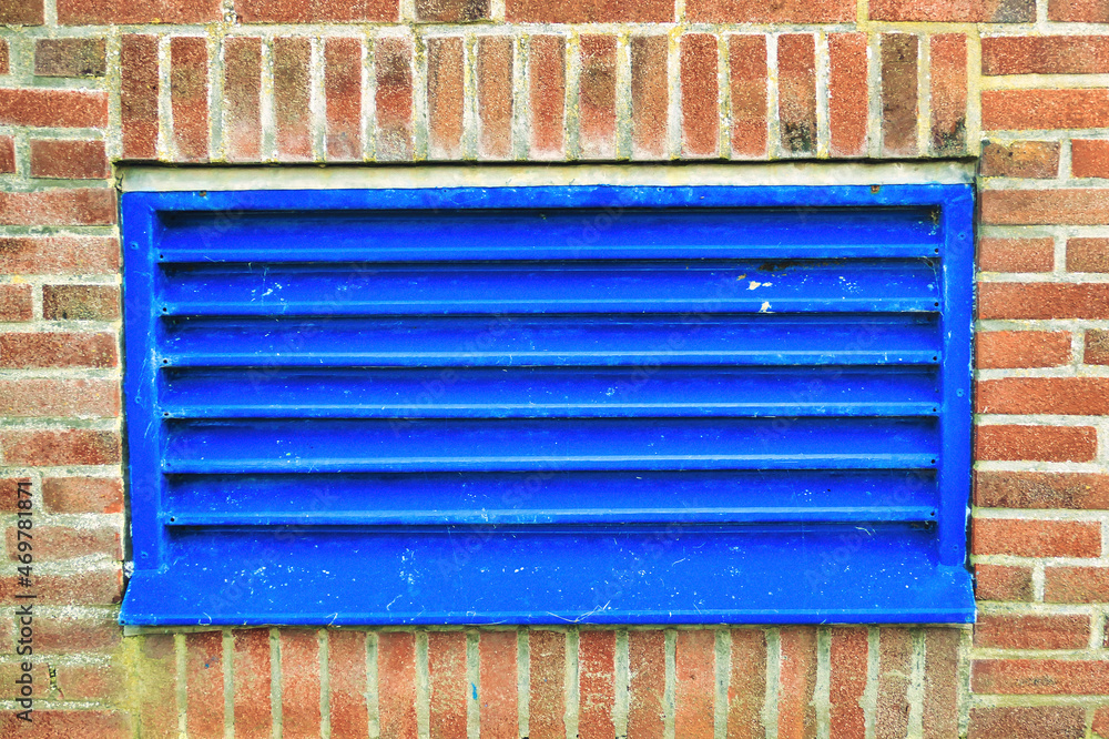 Blue ventilation duct in an industrial building. Air intake and outtake