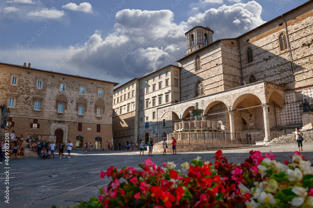 Perugia, Umbria, Italy. August 2020. Amazing view of Piazza IV Novembre with the historic fountain in evidence. Beautiful summer day, people in the square.